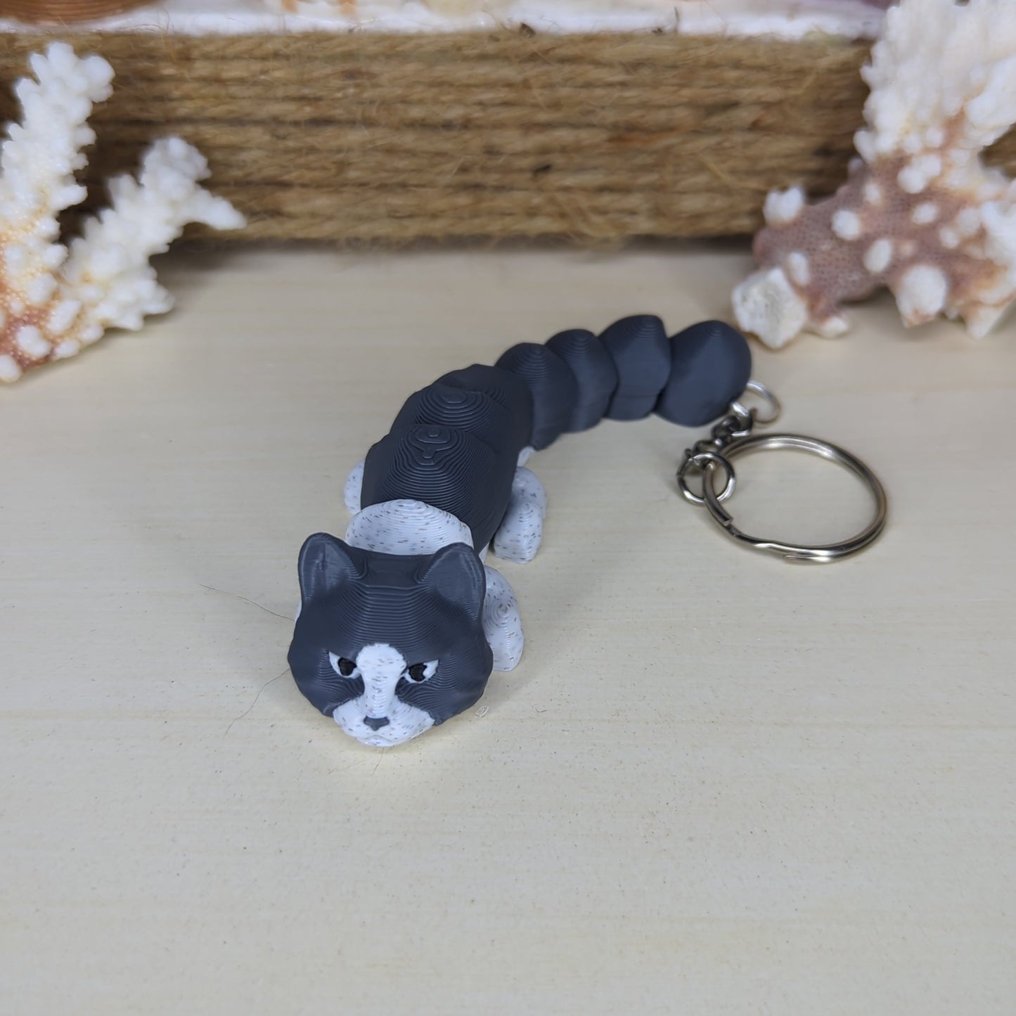 Gray tuxedo flexi keychain