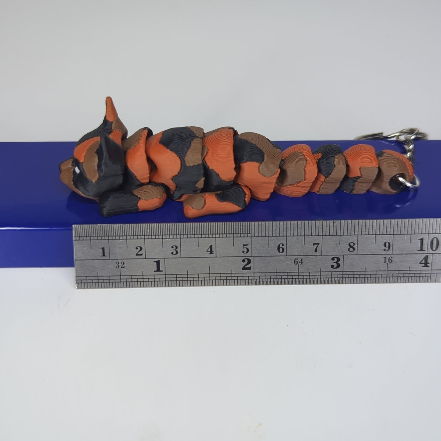 Torty orange flexi keychain